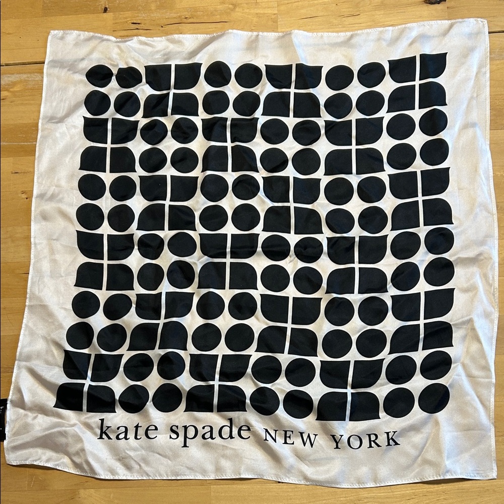 Kate Spade. Cream white silk scarf with black logo tag. 19x20